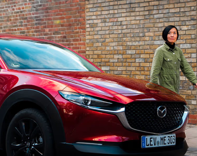 Mazda safety tips - hand on steering wheel